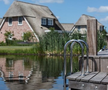 Watervilla   zwemtrap   zwemsteiger  steigerzwemtrap   rvs   tuin aan het water   wonen aan het water   zwemmen