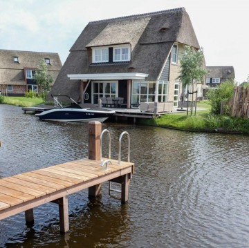 Watervilla   zwemtrap   zwemsteiger  steigerzwemtrap   rvs   tuin aan het water   wonen aan het water   zwemwater